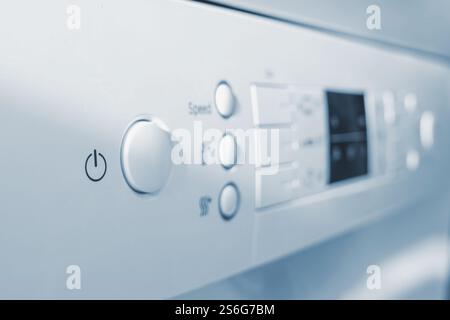 Close-up view of dishwasher start button and control panel Stock Photo