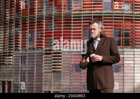 mature businessman using mobile phone Stock Photo