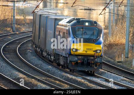 Direct Rail Services Class 68 locomotive Valiant number 68007 seen on the West Coast main line at Winwick. Stock Photo