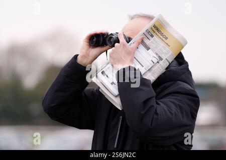 A racegoer on day one of the 2025 Cheltenham Festival at Cheltenham ...