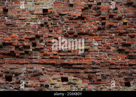 Broken brick wall background texture. Textured background of brick wall. Clinker brick. Wall from brick background. Grunge, wall background Stock Photo