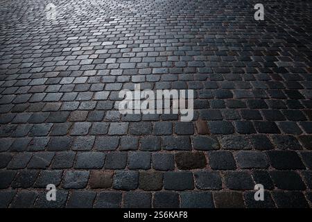 Stone pavement texture. Granite cobblestoned pavement background. Pavement texture Stock Photo