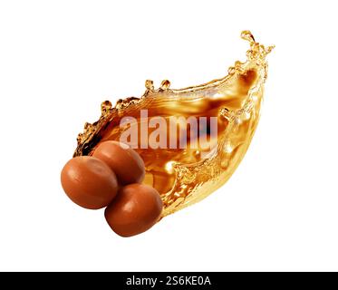 Caramel candy with nice splash isolated on white background Stock Photo