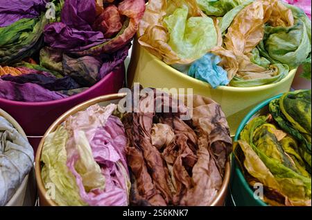 Group of multicolored silk scarves with abstract batik design Stock Photo