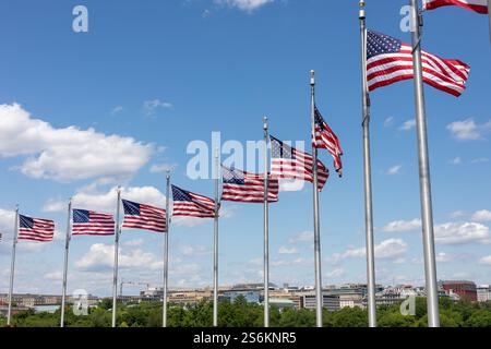 Washington DC, USA, 11 May 2021 American Flag and soldier boots against the Vietnam memorial wall Stock Photo