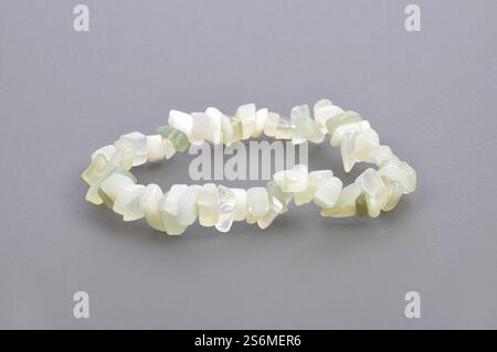 Jade sliver necklace on a gray background Stock Photo