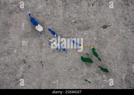 Map and flag of Solomon Islands on weathered concrete Stock Photo