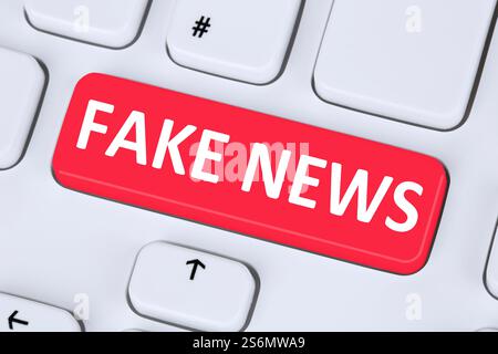 fake news news truth lie media symbol internet button online computer keyboard Stock Photo