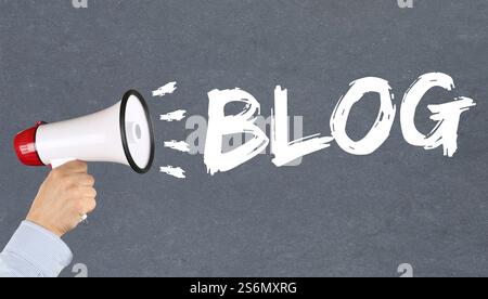 Blog writing Blogger online on the Internet Hand with Megafon Stock Photo