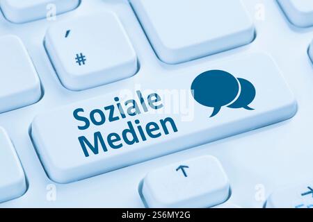 social media social network friendship contacts internet blue computer keyboard Stock Photo