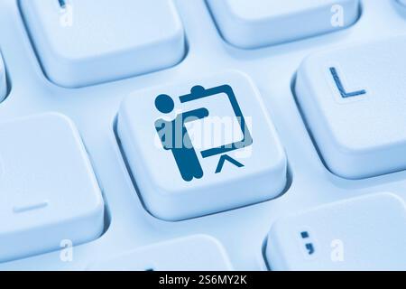 training training learn coaching education workshop online internet symbol blue computer keyboard Stock Photo