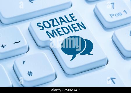 social media social network friendship contacts internet icon computer keyboard blue Stock Photo
