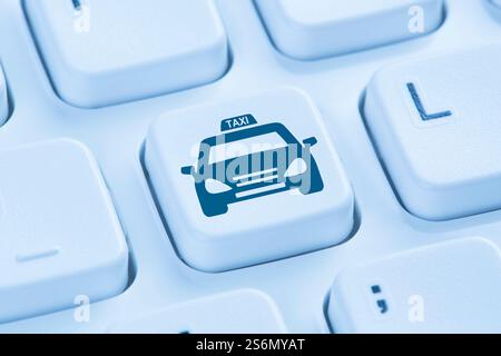 Book cab online order Internet Symbol blue Computer Keyboard Stock Photo