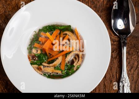 Austrian pancake soup on wood Stock Photo