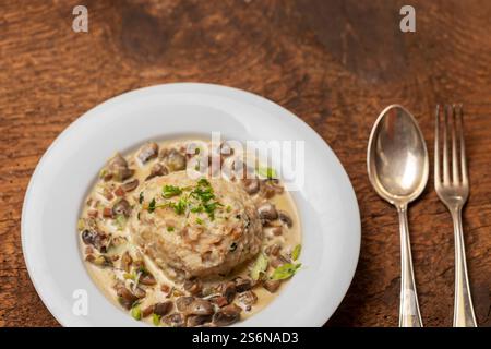 Bavarian dumplings in mushroom sauce Stock Photo