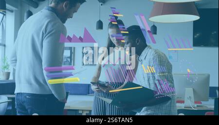 Business data analysis image over diverse colleagues discussing documents in office Stock Photo