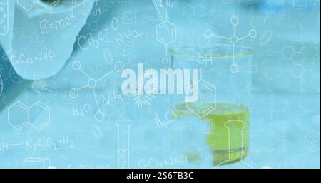 Image of mathematical equations over beaker with liquid in lab Stock Photo