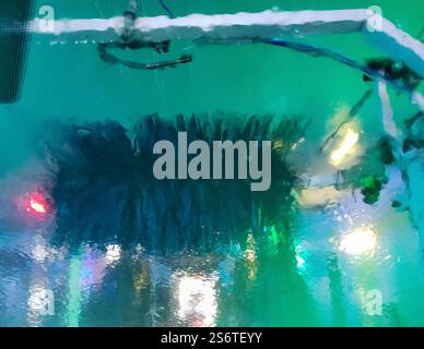 Windshield passing through a car wash Stock Photo