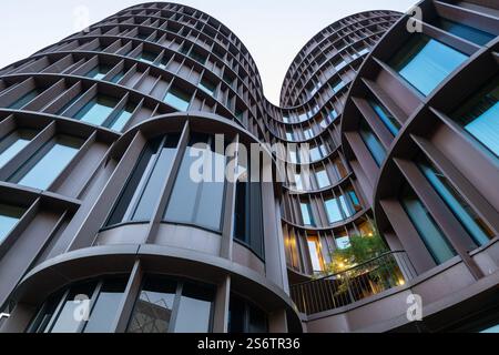 Copenhagen, Denmark - Jul 27, 2024: Axel Towers comprising five round towers Modern Office Buildings Glass and Copper in Copenhagen opposite of Tivoli Stock Photo