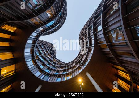 Copenhagen, Denmark - Jul 27, 2024: Axel Towers comprising five round towers Modern Office Buildings Glass and Copper in Copenhagen opposite of Tivoli Stock Photo