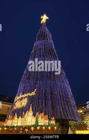Largest Christmas tree in the world, coloured lights and angels on top, Christmas market, Dortmund, Ruhr area, North Rhine-Westphalia, Germany, Europe Stock Photo