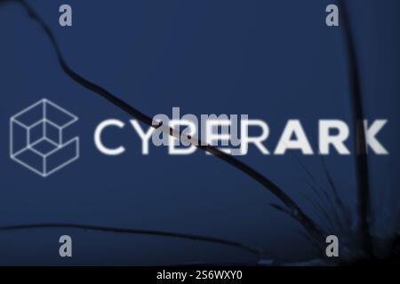 Cyberark logo is visible on the broken glass. CyberArk Software Ltd. is an Israeli publicly traded information security company Stock Photo