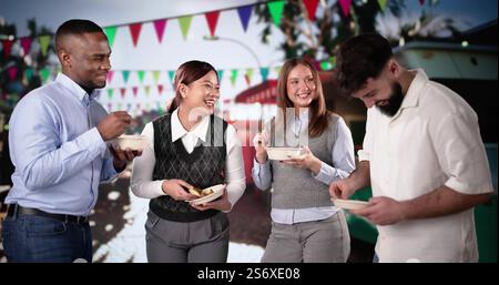 Group Of Friends Having Fun Eating Street Food Meal Stock Photo