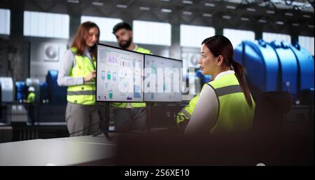 Engineer Operators Using Scada System At Industrial Plant Stock Photo