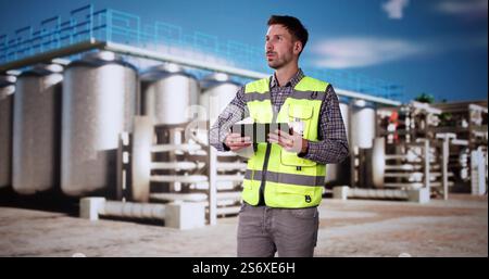 Silo Industrial Facility Manager At Work. Safety Inspector Stock Photo