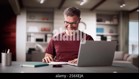 Happy Smiling Man Reading Letter Document. Good News Stock Photo