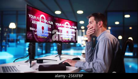 Ransomware Malware Cyber Attack On Business Computer Stock Photo
