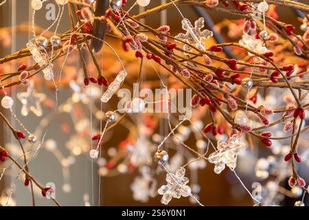 Full frame defocused texture abstract of hanging Christmas holiday light strings and ornaments with blurred background Stock Photo