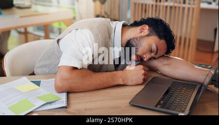 Burnout, deadline and sleep with business man at desk in office for break, recovery or rest. Documents, fatigue and laptop with exhausted employee in Stock Photo