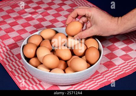 Chicken eggs in a bowl Stock Photo