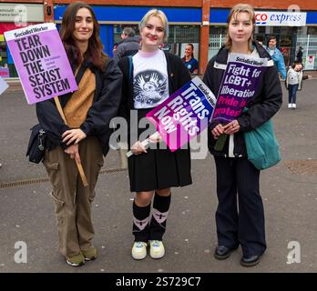 Bournemouth, Dorset, UK. 18th January 2025. Women’s Rights March takes place in Bournemouth, one of many being held across the country, marching in solidarity with women, people and marginalised communities whose fundamental rights are under threat. Protesters holding Socialist Worker placards that read Tear down the sexist system, Trans rights now & Fight for LGBT+ liberation. Credit: Carolyn Jenkins/Alamy Live News Stock Photo