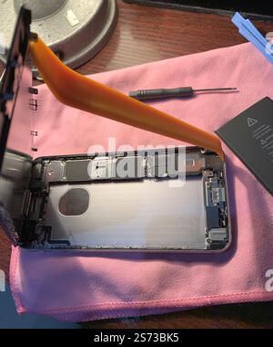 Disassembled smartphone case during repair. Stock Photo