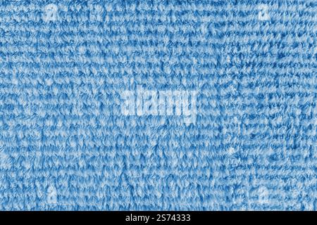 Terry cloth, striped pattern blue towel texture background. Soft fluffy textile bath or microfiber beach towel material. Top view, close up, macro. Stock Photo