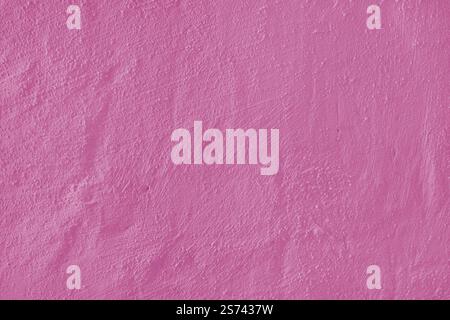 Stucco plaster surface, brushstroke background, close up, macro texture of pink painted cement, concrete wall texture. Wallpaper, backdrop, architectu Stock Photo