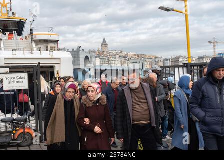 Istanbul, Turkey. 08th Jan, 2025. A crowd of passengers disembark the ferry from the Asian side of the Turkish city of Istanbul. With an ever expanding population in excess of 15 million people, Istanbul is the largest city in Turkey; spanning the continents of Europe and Asia is a dynamic economic and cultural hub and the former historical capital. Credit: SOPA Images Limited/Alamy Live News Stock Photo