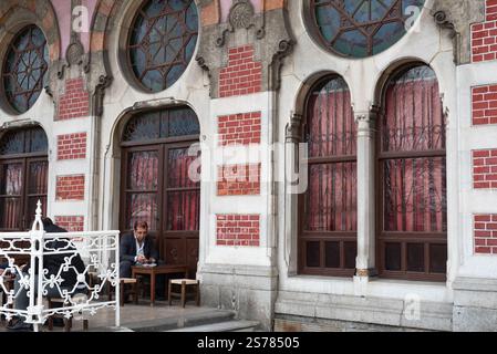 Istanbul, Turkey. 08th Jan, 2025. A man drinks tea in a café at the historical Sirkeci Railway Station, famous as the terminus of the Orient Express. With an ever expanding population in excess of 15 million people, Istanbul is the largest city in Turkey; spanning the continents of Europe and Asia is a dynamic economic and cultural hub and the former historical capital. Credit: SOPA Images Limited/Alamy Live News Stock Photo