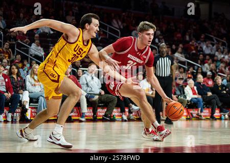 Los Angeles, USA. 18th Jan 2025. Wisconsin Badgers forward Nolan Winter (31) drives against USC Trojans forward Harrison Hornery (30) during a NCAA men’s basketball game, Saturday, January 18, 2025, at the Galen Center, in Los Angeles, CA. The Badgers defeated the Trojans 84-69. (Jon Endow/Image of Sport) Credit: Image of sport /Alamy Live News Stock Photo