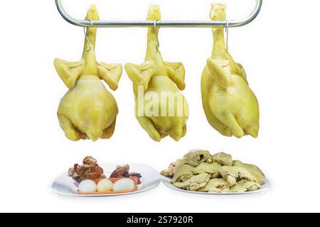 Die cut of Chicken rice, hanging chicken on white isolated. Stock Photo