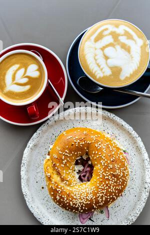 Bagel with Polish cottage cheese (twarog) and coffee at Paloma Coffee, Wroclaw, Poland Stock Photo