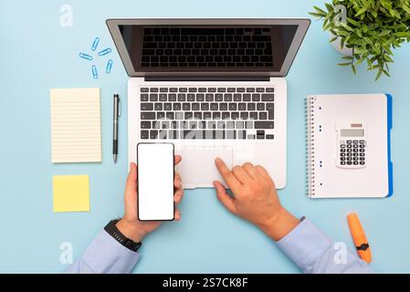 Laptop and smartphone top view, mockup workplace concept Stock Photo