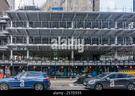 Construction of office block at 14-21 Holborn Viaduct showing steel beam construction with web openings. Stock Photo