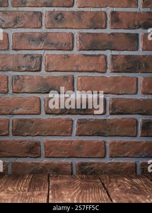 Brick wall and part of wooden table, template for designer Stock Photo