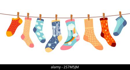 Socks on rope. Cotton or wool sock dry and hang on laundry string with clothespins. Children socks with textures and patterns vector cartoon. Illustration wool and cotton socks in rope. Socks on rope. Cotton or wool sock dry and hang on laundry string with clothespins. Children socks with textures and patterns vector cartoon Stock Vector