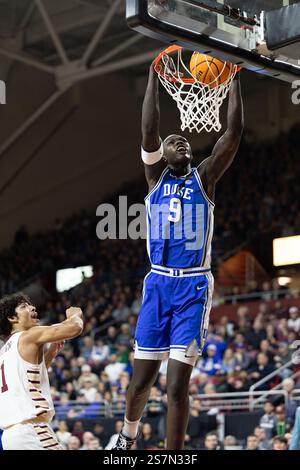 Duke center Khaman Maluach dunks over Louisville guard Chucky Hepburn ...