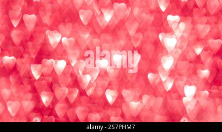 Heart shaped bokeh lights on a pink background symbolizing love and romance Stock Photo