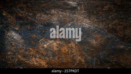 A close-up view of a dark textured stone surface showcasing intricate natural patterns and colors. Stock Photo